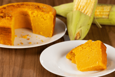 Qual é a origem do bolo de milho